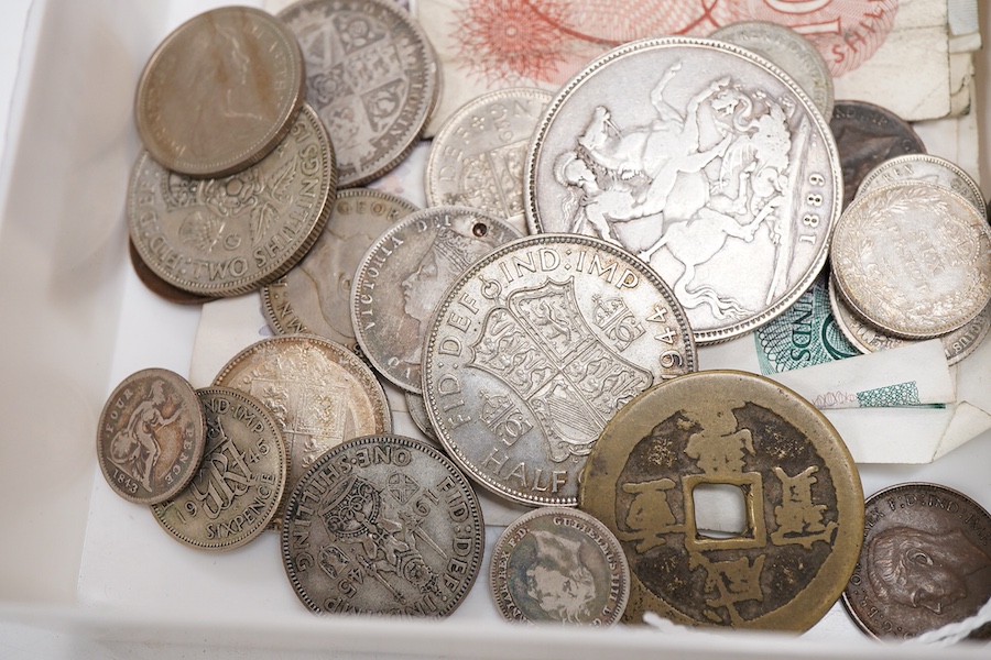 A collection of various banknotes and coins
